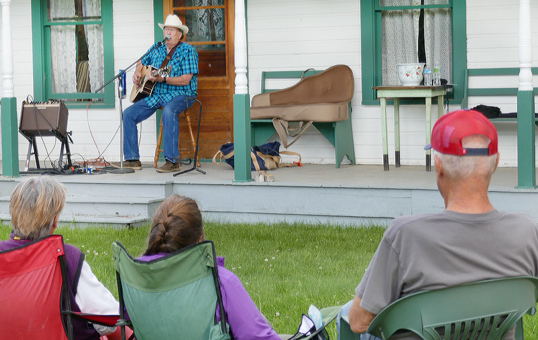 Gene Farrar plays guitar